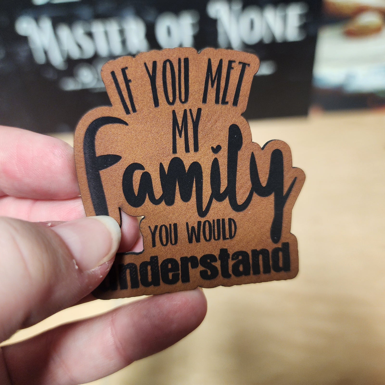 Personalized leatherette hat patch saying 'If you met my family you would understand', perfect for family-themed hats.