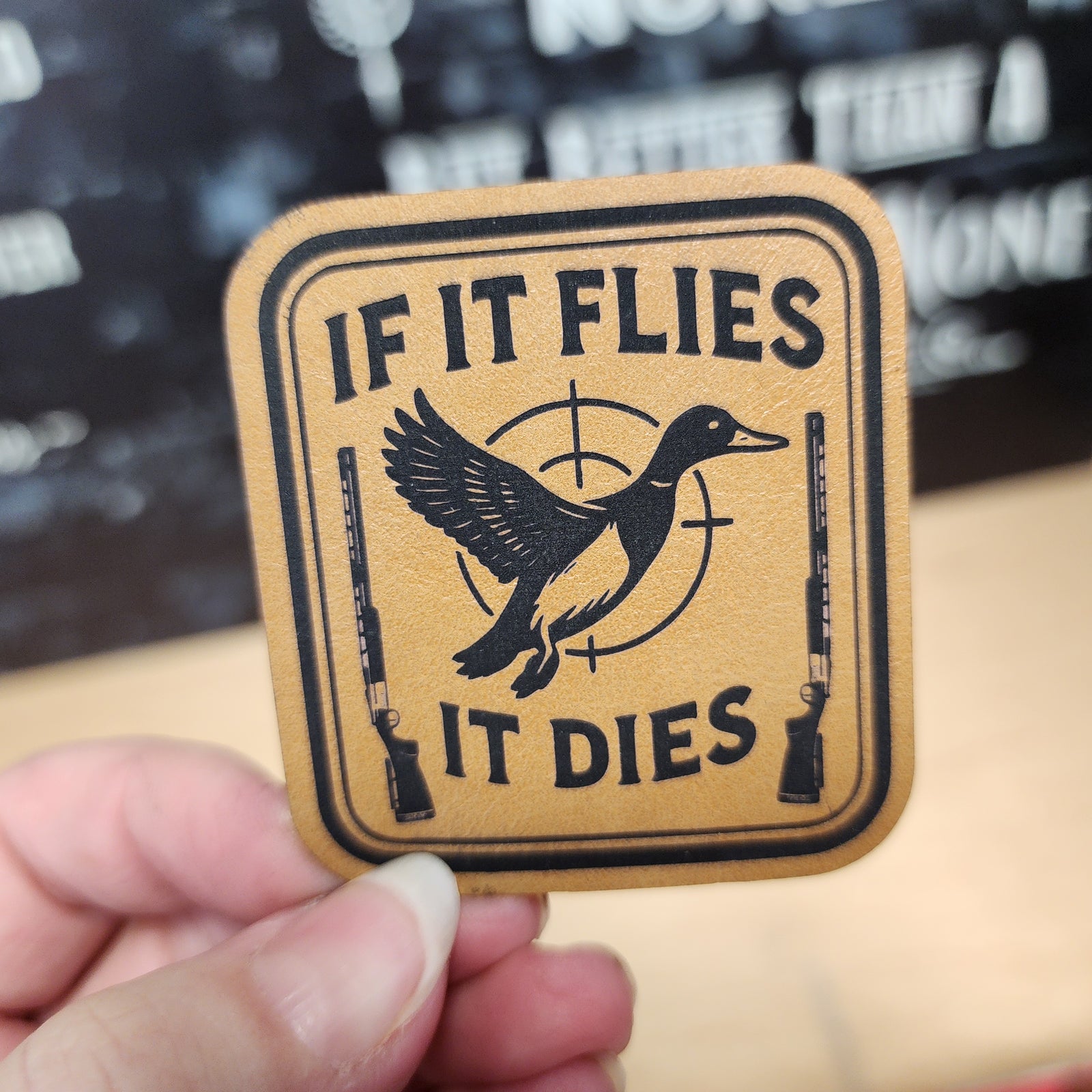 Hunting leatherette patch featuring duck graphic and 'If It Flies It Dies' slogan for outdoor enthusiasts.