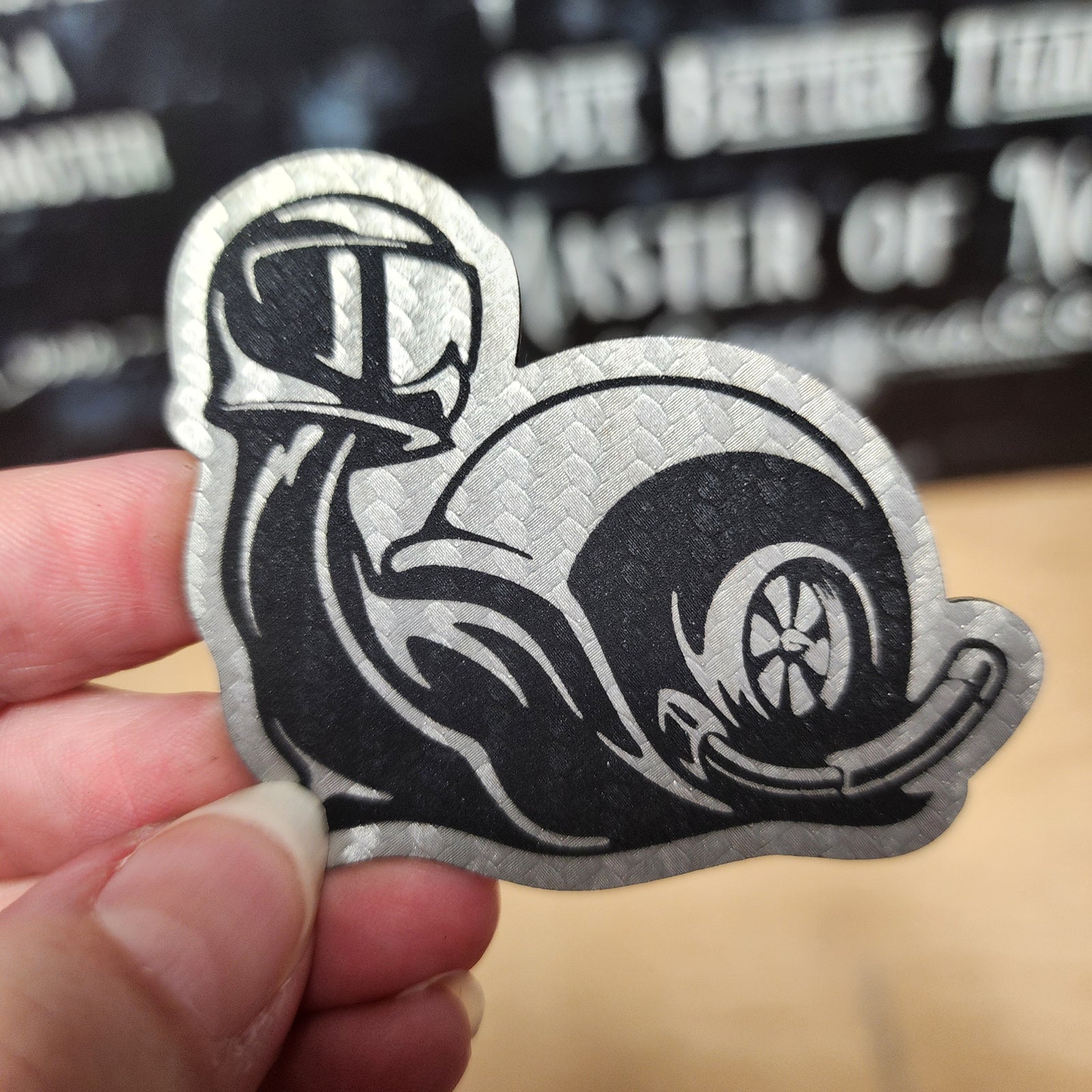 Cool snail leatherette hat patch with a stylish design, perfect for trucker hats and personalized gifts.