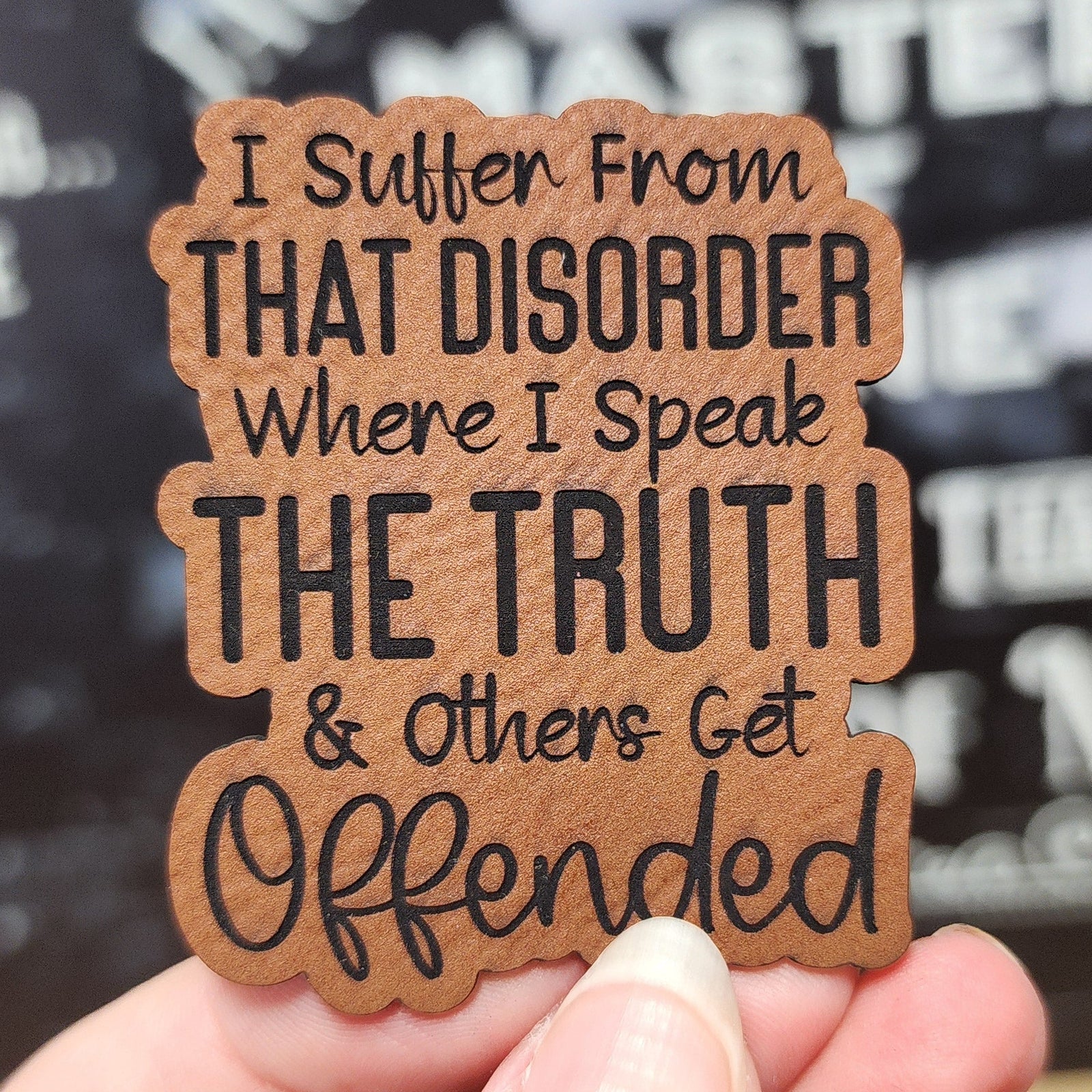 Funny leatherette hat patch that reads 'I Suffer From That Disorder Where I Speak The Truth & Others Get Offended'.