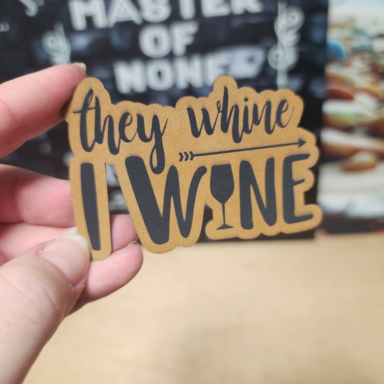 They Whine I Wine leatherette hat patch, perfect for wine lovers and fun apparel accessories.