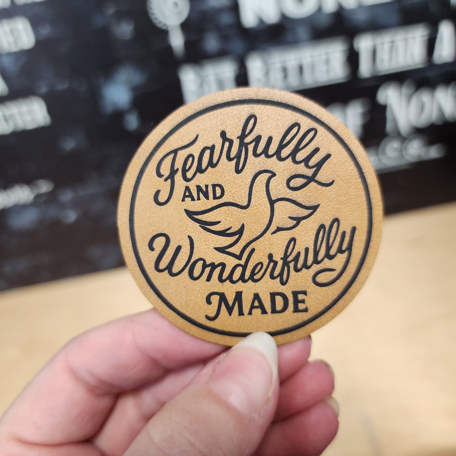 Fearfully and Wonderfully Made leatherette hat patch with a dove design, perfect for hats and accessories.