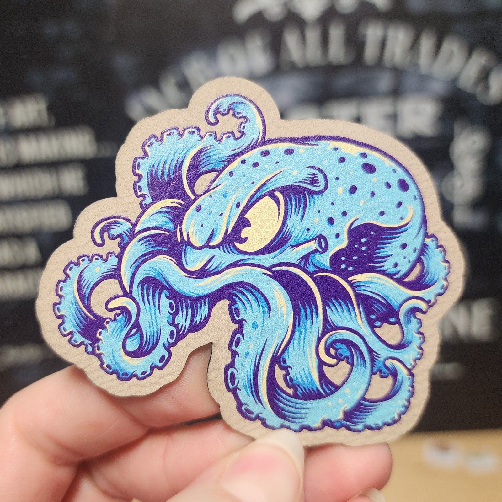 Octopus leatherette hat patch, vibrant ocean design, perfect for nautical themed apparel and accessories.