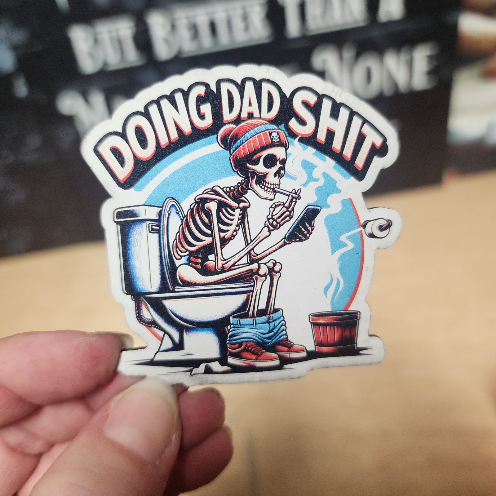 Funny Dad Life leatherette patch featuring a skeleton on the toilet, perfect for humorous gifts and dad decor.