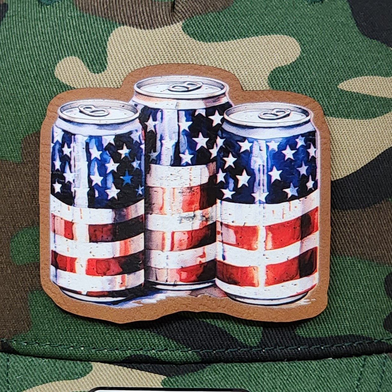 Fourth of July leatherette hat patch featuring American flag themed beer cans for festive outdoor celebrations.