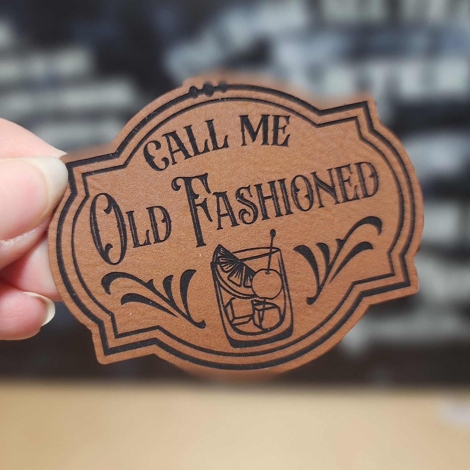 Leatherette hat patch featuring 'Call Me Old Fashioned' design, perfect for cocktail lovers and bar decor.