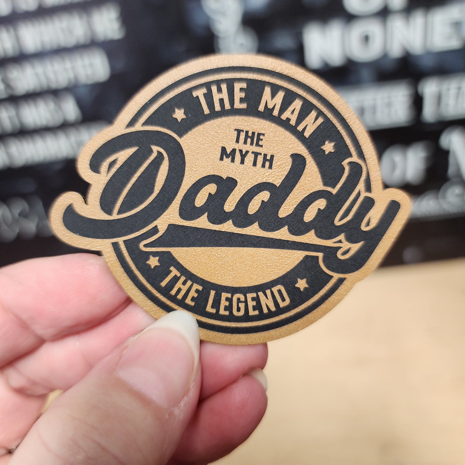Leatherette hat patch for dads reading 'The Man, The Myth, Daddy, The Legend' for Father's Day gift ideas.
