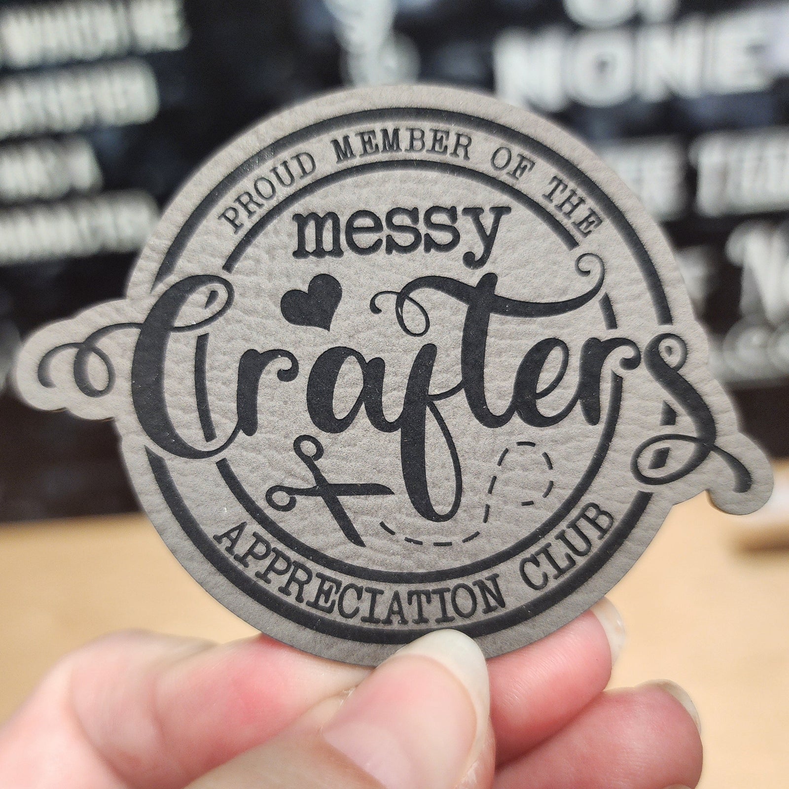 Messy Crafters Appreciation Club leatherette hat patch for crafting enthusiasts and creative gift ideas.