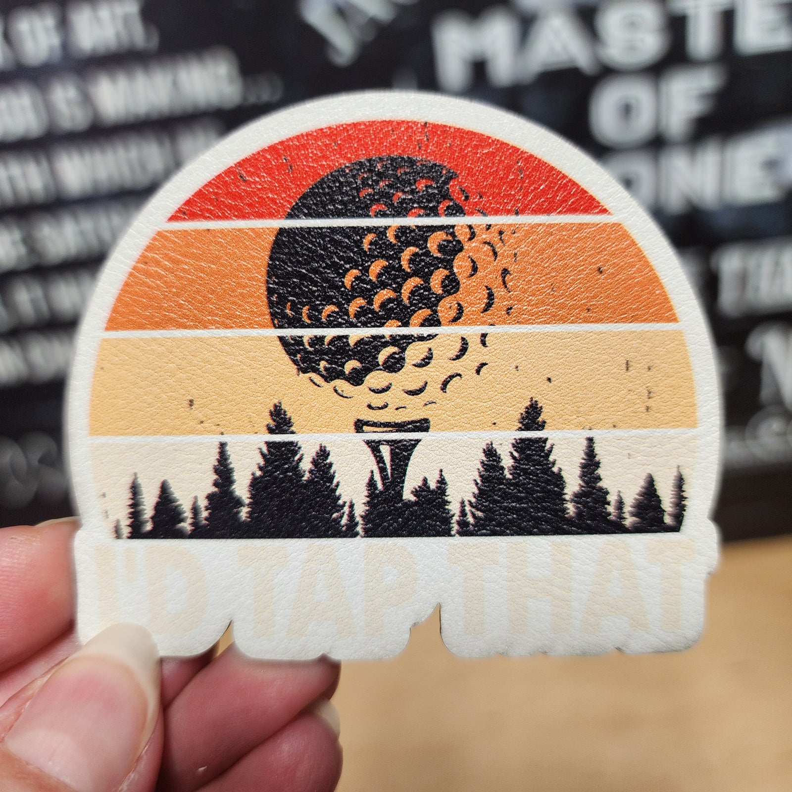 Retro golfing leatherette hat patch with sunset design and golf ball, perfect for golf lovers and outdoor enthusiasts.