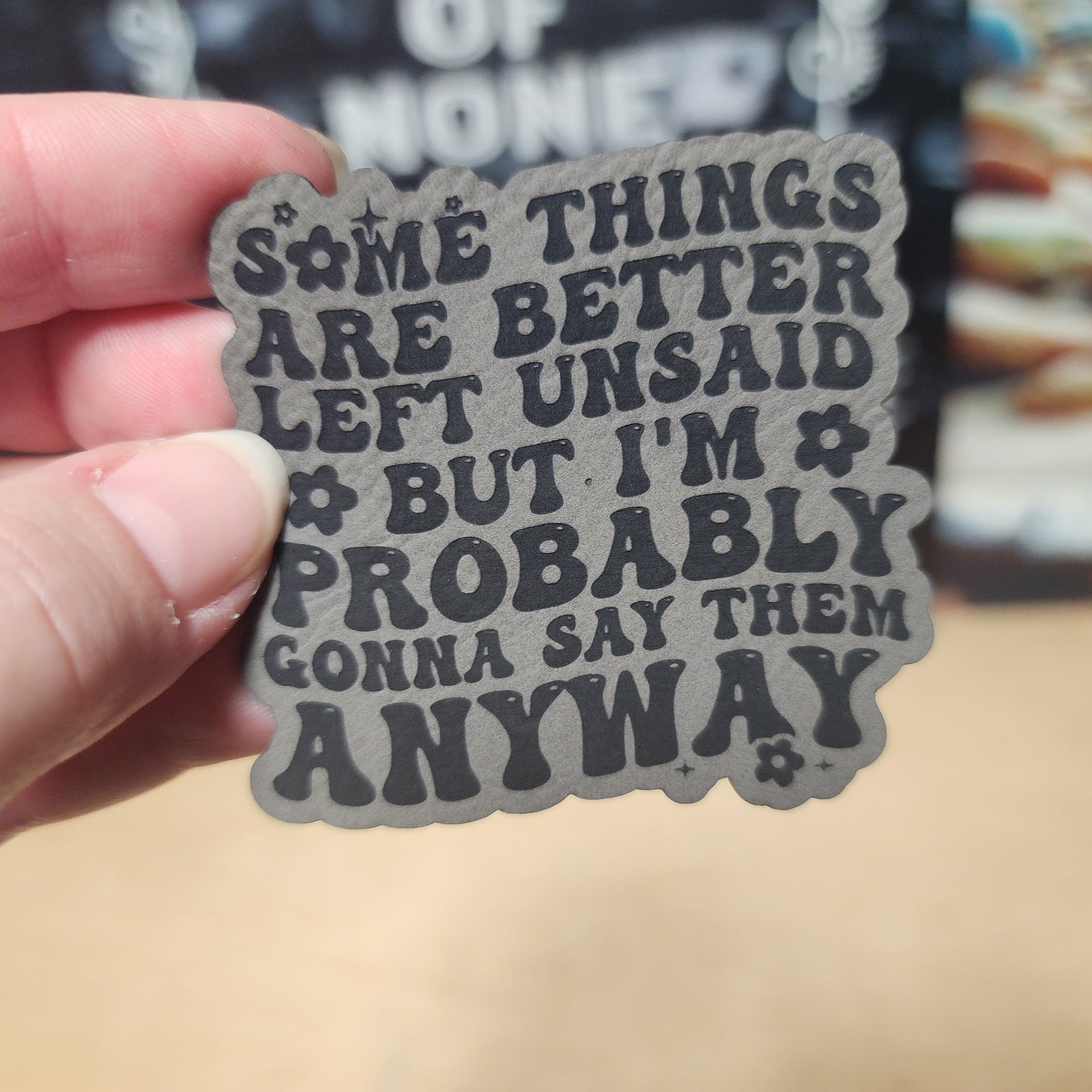 Humorous leatherette hat patch with bold text, ideal for quirky fashion statements or gift ideas.